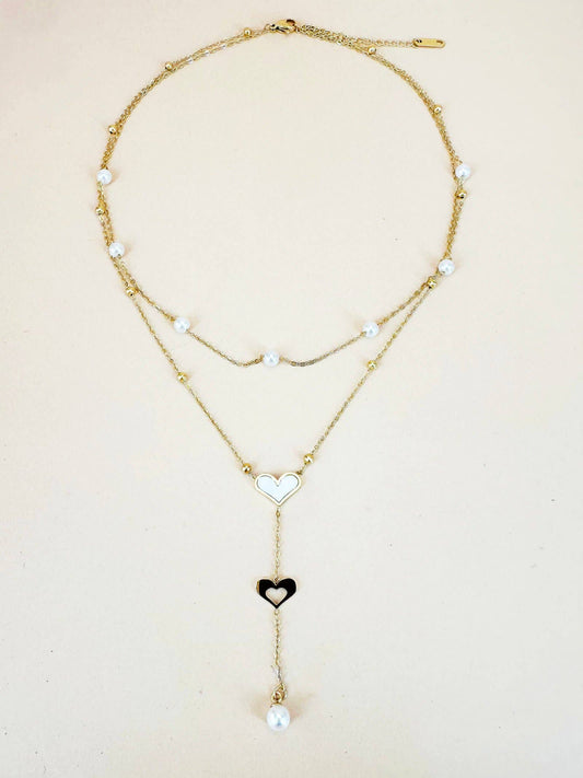 Collana a doppia catena con perle e pendente