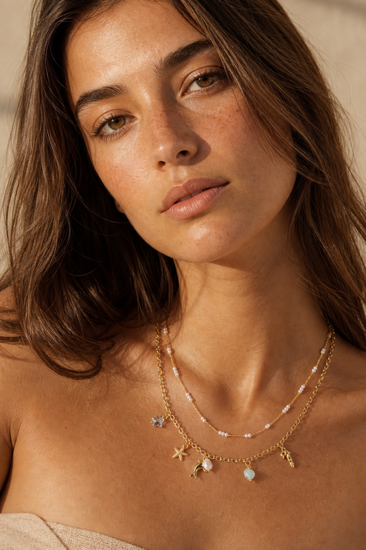 Collana doppia catena perle e ciondoli Delfino