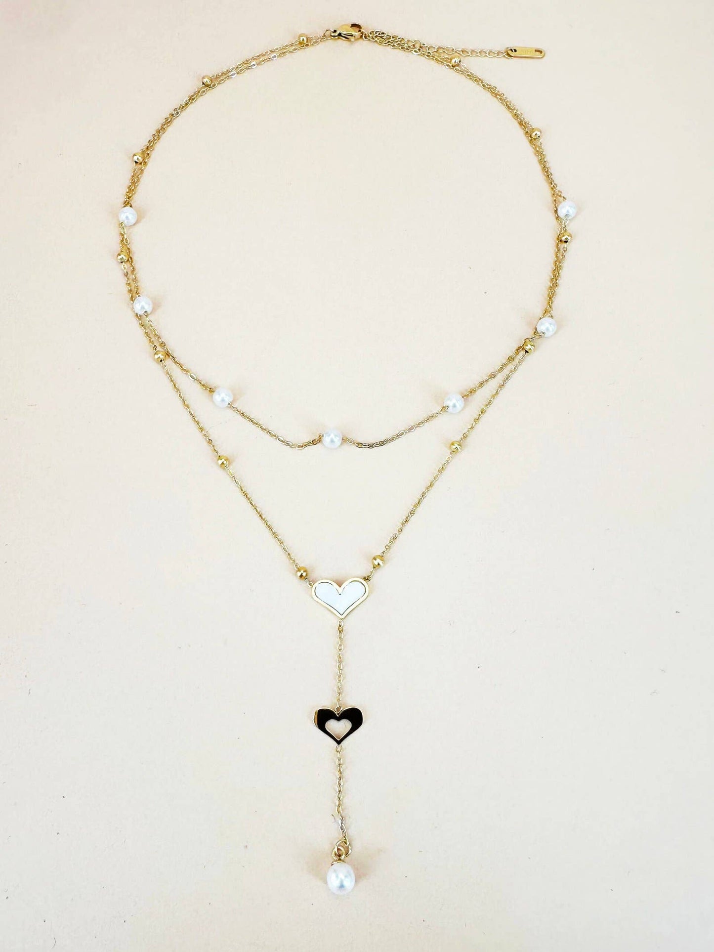 Collana a doppia catena con perle e pendente
